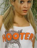 Models wearing Hooters Girl outfits
